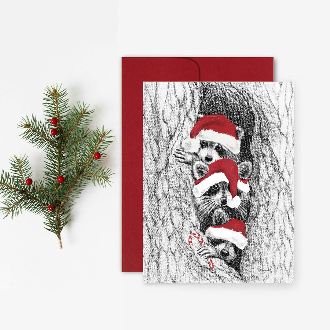 3 Raccoons in a tree with red hats - Christmas greeting card - LE NID atelier